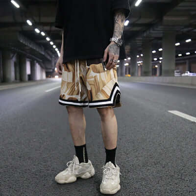 Shorts featuring a stylish pattern, ideal for active wear and outdoor activities, showcasing flexibility and comfort.