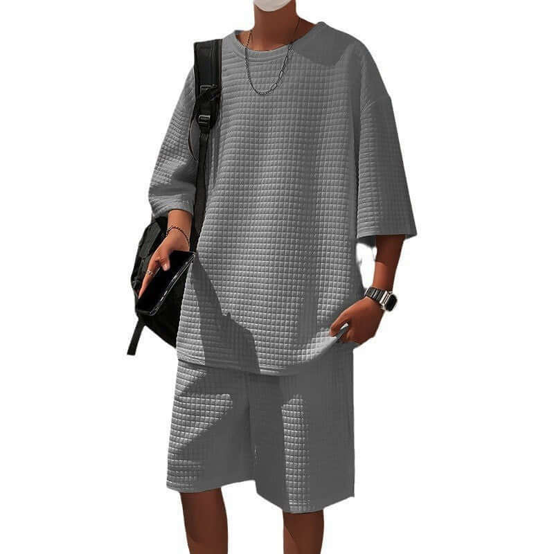 Men's loose short sleeve suit with shorts in gray, perfect for casual and versatile everyday wear.