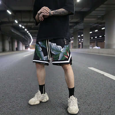 Shorts Floral loose shorts beach shorts featuring vibrant tropical leaf design perfect for active lifestyles.